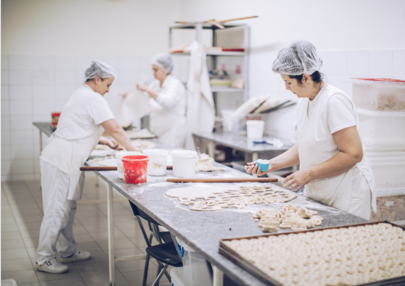 SSFPA's women's initiative: woman cutting cookie dough.